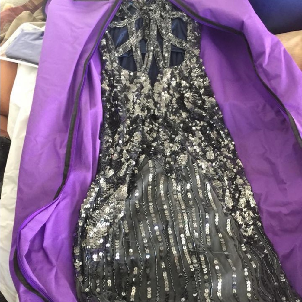 Trudy’s Silver sequin dress